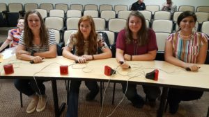 4-H Kids sitting at a table