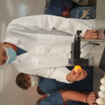 Forsyth County 4-H'er practices candling eggs.