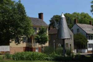 image of houses and teapot statue at Old Salem