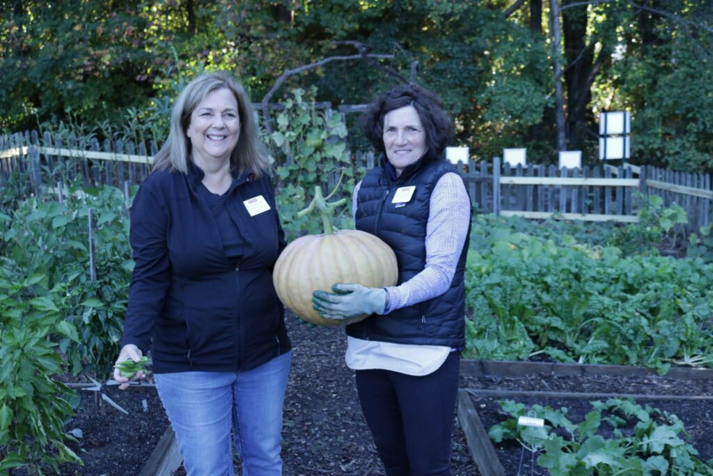 Volunteers with pumpkin